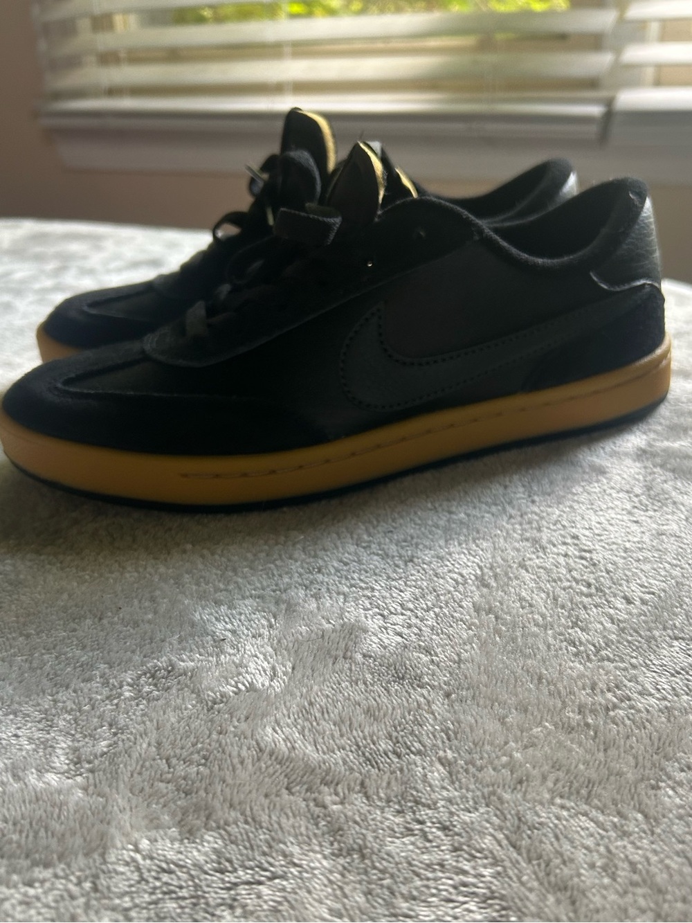 Nike Women's Black Sneakers with Yellow Sole